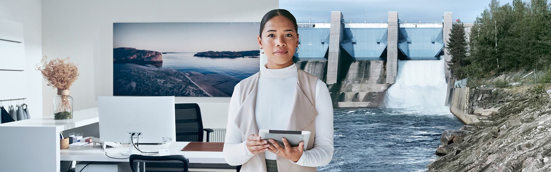 Frau hält Tablet in der Hand. Der Hintergrund zeigt ein Büroraum und eine Wasserkraftanlage.